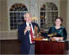 Don Armington accepting JYC Yacht Person Award from Past Commodore Lois Cone